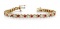 14KT YELLOW GOLD 3 CTW G-H VS2/SI1 CLASSIC ROUND BEZEL SET DIAMOND & GARNET TENNIS BRACELET