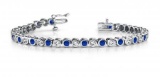 14KT WHITE GOLD 2 CTW G-H VS2/SI1 CLASSIC ROUND BEZEL SET DIAMOND & TANZANITE TENNIS BRACELET