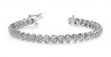 14K WHITE GOLD .90 CTW G-H I1/I2 FLOATING DIAMOND HEART BRACELET