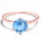 1.08 CT SKY BLUE TOPAZ 10KT SOLID RED GOLD RING