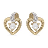 14k Yellow Gold Pearl And Diamond Heart Earrings 0.01 CTW