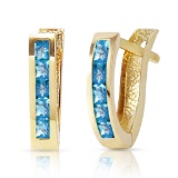 1.2 Carat 14K Solid Gold Oval Huggie Earrings Blue Topaz