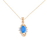 Certified 14k Yellow Gold Oval Blue Topaz And Diamond Pendant 0.11 CTW