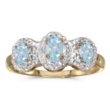 Certified 10k Yellow Gold Oval Aquamarine And Diamond Three Stone Ring 0.43 CTW