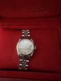Used Ladies OysterPerpetual 26mm Rolex w/factory diamonds comes with box and papers