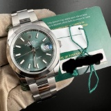 NEW OYSTERPERPETUAL DATEJUST GREEN DIAL 41 MM IN OYSTERSTEEL COMES WITH BOX AND PAPER