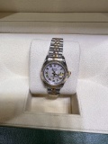 26 MM USED LADIES ROLEX OYSTER PERPETUAL COMES WITH BOX AND APPRAISAL