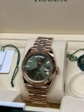 Brand New Rolex DayDate 40mm Green Dial comes with box and papers