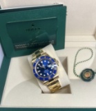 Brand New 40mm 18ct Yellow Gold Submariner Smurf comes with box and papers