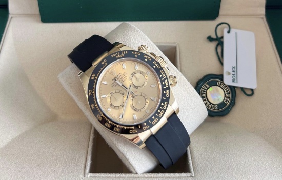 Brand New 18kt Gold Daytona on Oysterflex Strap Comes with Box and Papers