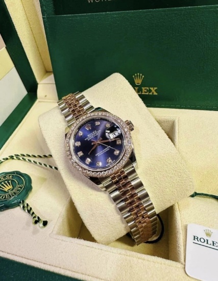 New 26mm Ladies Datejust Rolex w/factory dial & bezel comes with box and pa