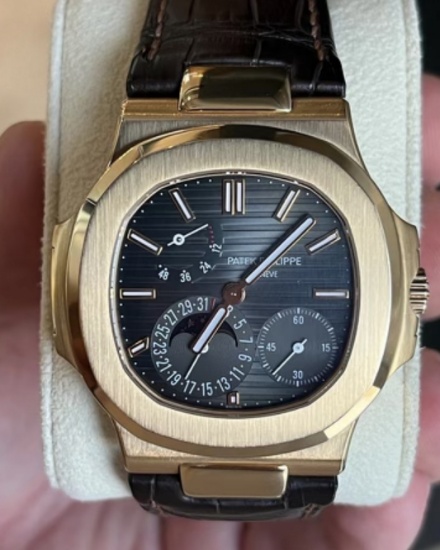 Patek Philippe Gold Nautilus 5712R comes with Box & Papers