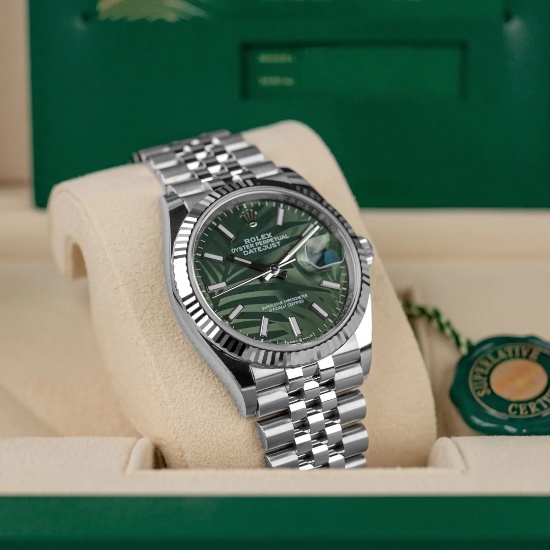 Brand New Oysterperpetual Rolex 36mm Green Dial Comes with box and certific
