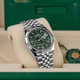 Brand New Oysterperpetual Rolex 36mm Green Dial Comes with box and certific