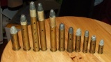 12 old large caliber bullets.