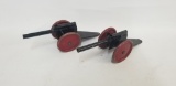2 tin toy cannons