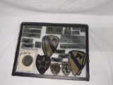 Display case of Army patches