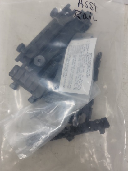 Bag lot rail assemblies