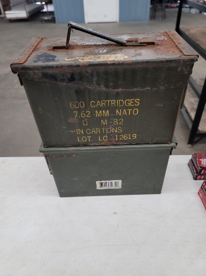 2 empty ammo cans (one is pretty rusted)