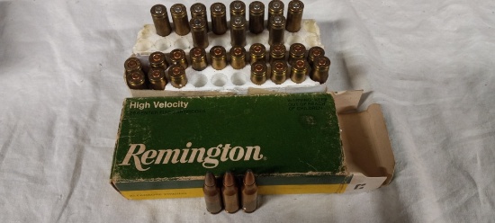3 live rnds & 28 empty brass 221 Fireball