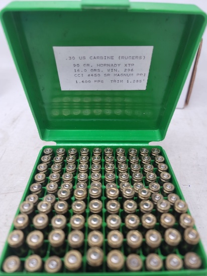 39 rounds 30 carbine reloads & 61 spent R/P brass