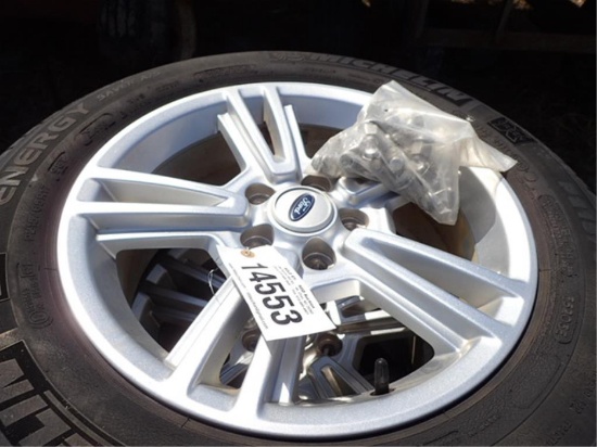 (4) Michelin Tires P215/65R17 w/ 5 Lug Ford Rims