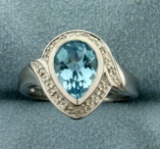 Diamond And Blue Topaz Ring