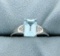 Blue Topaz And Diamond Ring In Sterling Silver
