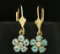 Sky Blue Topaz And Diamond Flower Earrings