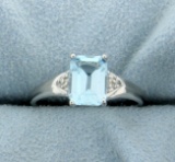Blue Topaz And Diamond Ring In Sterling Silver