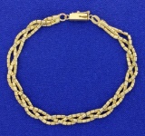 6 3/4 Inch Braided Gold Bracelet