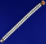 Double Strand Akoya Pearl Bracelet With 14k Gold And Ruby Clasp