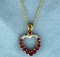 Ruby And Diamond Heart Pendant On 14k Gold Chain