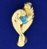 Manatee Pendant With Blue Topaz And Diamonds In 14k Gold