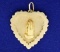 Heart Pendant With Praying Hands