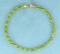 18 Carat Peridot Bracelet In 14k Gold