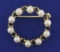 Vintage Pearl And Sapphire Circle Pin In 14k Yellow Gold