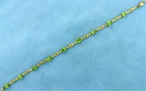 Unique Knot Link 4.5ct Tw Peridot Gold Bracelet