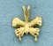 Butterfly Design Charm Holding Pendant In 14k Yellow Gold