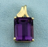 Over 10ct Emerald Cut Natural Amethyst Pendant In 10k Yellow Gold
