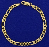 Italian Made Figaro Link Bracelet In 14k Yellow Gold