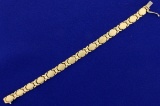 7 Inch Gold Bracelet With Satin Finish In 14k Yellow Gold