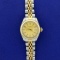 Rolex Date Two Tone Woman's Watch With Champagne Face Model 6917