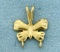 Butterfly Design Charm Holding Pendant In 14k Yellow Gold