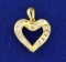 1/4 Ct Tw Baguette And Round Diamond Heart Pendant In 14k Yellow Gold