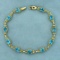 5 1/2ct Tw Swiss Blue Topaz Bracelet In 10k Yellow Gold