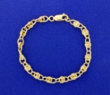 Designer Link Bracelet In 14k Yellow Gold
