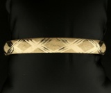 Diamond Cut Criss Cross Bangle Bracelet In 10k Yellow Gold