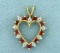 Ruby And Diamond Heart Pendant In 14k Yellow Gold