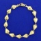 7 1/2 Inch Heart Link Heart Bracelet In 14k Yellow Gold